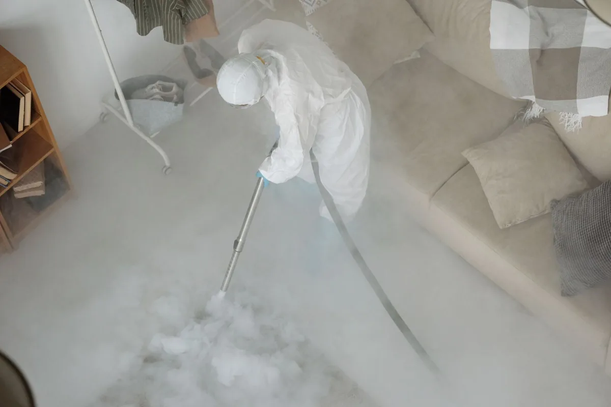 Biohazard cleanup technician in protective equipment, Teaticket, MA